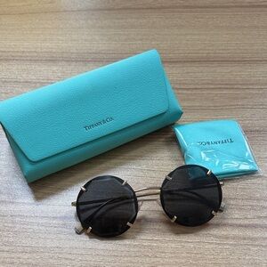 Tiffany & Co. Round Black Sunglasses with Blue Case. Originally $548